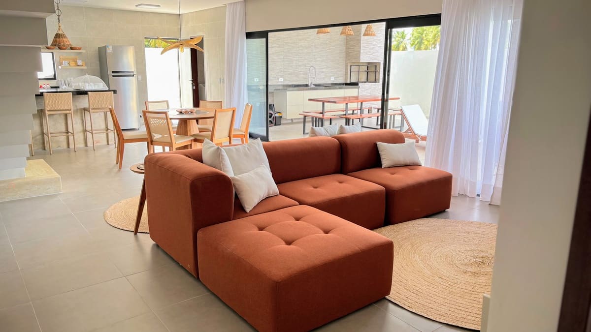 Sala de estar confortável com TV Smart - Refúgio dos Corais