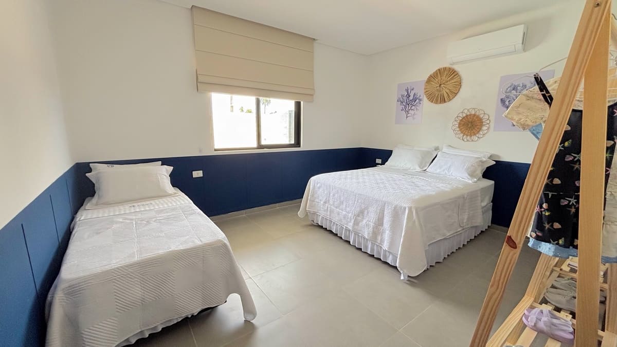 Suíte Coral Azul com ar-condicionado e conforto - Refúgio dos Corais